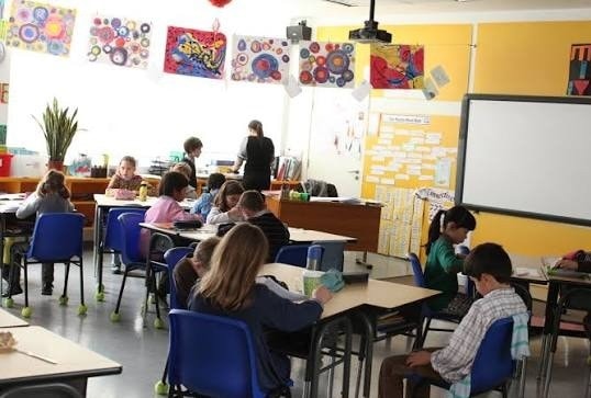 Students attending a lesson at a French school in Shanghai