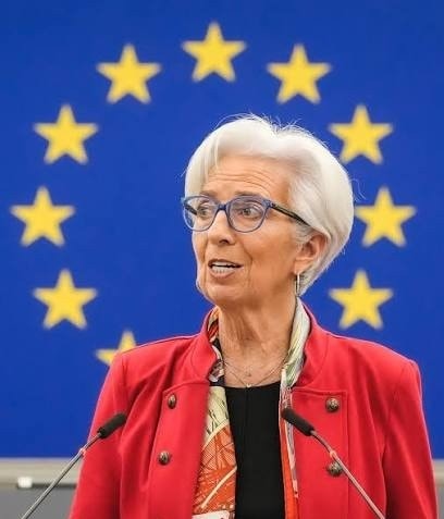 ECB President Christine Lagarde speaking in front of the European Union flag